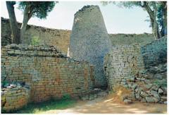 167. Conical tower of Great Zimbabwe/ Circular wall of Great Zimbabwe
Location: Southeastern Zimbabwe
Artist: (attributed to ________________)
Date: c. 1000 - 1400 C.E.
Culture: Shona peoples
Period/Style: ...
Medium/Material: Coursed granite blocks
Theme(s): power, royalty
Form: great grain tower within the great enclosure
Function: to store grains or other food supplies
Content: tall tower that was laid in blocks that were not plastered together
Context: Great Zimbabwe is a ruined city in the southeastern hills of Zimbabwe. 167. Conical tower of Great Zimbabwe/ Circular wall of Great Zimbabwe
Location: Southeastern Zimbabwe
Artist: (attributed to ________________)
Date: c. 1000 - 1400 C.E.
Culture: Shona peoples
Period/Style: ...
Medium/Material: Coursed granite blocks
Theme(s): power, royalty
Form: great grain tower within the great enclosure
Function: to store grains or other food supplies
Content: tall tower that was laid in blocks that were not plastered together
Context: Great Zimbabwe is a ruined city in the southeastern hills of Zimbabwe.