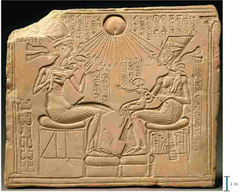 Akhenaten, Nefertiti, and Three Daughters
New Kingdom (Amarna), 18th Dynasty. c. 1353-1335 B.C.E. Limestone.
This small stele, probably used as a home altar, gives an seldom opportunity to view a scene from the private live of the king and queen. Akhenaten, Nefertiti, and Three Daughters
New Kingdom (Amarna), 18th Dynasty. c. 1353-1335 B.C.E. Limestone.
This small stele, probably used as a home altar, gives an seldom opportunity to view a scene from the private live of the king and queen.