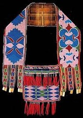Bandolier bag
Lenape (Delaware tribe, Eastern Woodlands). c. 1850 C.E. Beadwork on leather
This is an object that invites close looking to fully appreciate the process by which colorful beads animate the bag, making a dazzling object and showcasing remarkable technical skill. Bandolier bag
Lenape (Delaware tribe, Eastern Woodlands). c. 1850 C.E. Beadwork on leather
This is an object that invites close looking to fully appreciate the process by which colorful beads animate the bag, making a dazzling object and showcasing remarkable technical skill.