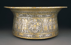 Basin (Baptistère de Saint Louis)
Muhammad ibn al-Zain. c. 1320-1340 C.E. Brass inlaid with gold and silver
The Mamluks, the majority of whom were ethnic Turks, were a group of warrior slaves who took control of several Muslim states and established a dynasty that ruled Egypt and Syria from 1250 until the Ottoman conquest in 1517.
The political and military dominance of the Mamluks was accompanied by a flourishing artistic culture renowned across the medieval world for its glass, textiles, and metalwork. Basin (Baptistère de Saint Louis)
Muhammad ibn al-Zain. c. 1320-1340 C.E. Brass inlaid with gold and silver
The Mamluks, the majority of whom were ethnic Turks, were a group of warrior slaves who took control of several Muslim states and established a dynasty that ruled Egypt and Syria from 1250 until the Ottoman conquest in 1517.
The political and military dominance of the Mamluks was accompanied by a flourishing artistic culture renowned across the medieval world for its glass, textiles, and metalwork.