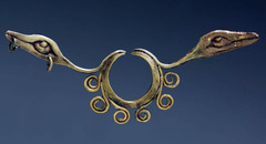 Chavin de Huantar
Worn by males and females under the nose
held in place by the semi-circular section at the top
two snake heads extend on either side
makes the wearer into a supernatural being during ceremonies/rituals
Symbolized power and wealth of wearer as well as adherence to religion Chavin de Huantar
Worn by males and females under the nose
held in place by the semi-circular section at the top
two snake heads extend on either side
makes the wearer into a supernatural being during ceremonies/rituals
Symbolized power and wealth of wearer as well as adherence to religion