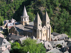 Church of Sainte-Foy
Conques, France. Romanesque Europe. Church: c. 1050-1130 C.E.; Reliuary of Saint Foy: ninth century C.E.; with later additions. Stone (architecture); stone and paint (tympanum); gold, silver, gemstone, and enamel over wood (reliquary)
One can see some of the most fabulous golden religious objects in France, including the very famous gold and jewel-encrusted reliquary statue of St. Foy. The Church of Saint Foy at Conques provides an excellent example of Romanesque art and architecture Church of Sainte-Foy
Conques, France. Romanesque Europe. Church: c. 1050-1130 C.E.; Reliuary of Saint Foy: ninth century C.E.; with later additions. Stone (architecture); stone and paint (tympanum); gold, silver, gemstone, and enamel over wood (reliquary)
One can see some of the most fabulous golden religious objects in France, including the very famous gold and jewel-encrusted reliquary statue of St. Foy. The Church of Saint Foy at Conques provides an excellent example of Romanesque art and architecture