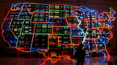 Electronic Superhighway
Nam June Paik. 1995 C.E. Mixed-media installation (49-channel closedcircuit video installation, neon, steel, and electronic components).
It is an enormous physical object that occupies a middle ground between the virtual reality of the media and the sprawling country beyond our doors. Electronic Superhighway
Nam June Paik. 1995 C.E. Mixed-media installation (49-channel closedcircuit video installation, neon, steel, and electronic components).
It is an enormous physical object that occupies a middle ground between the virtual reality of the media and the sprawling country beyond our doors.
