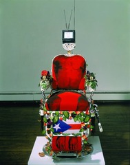 En la Barberia no se Llora (No Crying Allowed in the Barbershop)
Pepon Osorio. 1994 C.E. Mixedmedia installation.
Challenges definitions of masculinity, it also brings up in a more subtle way—the relationship between machismo and homophobia, violence, and infidelity, and the ways in which popular culture, religion, and politics help craft these identities and issues. En la Barberia no se Llora (No Crying Allowed in the Barbershop)
Pepon Osorio. 1994 C.E. Mixedmedia installation.
Challenges definitions of masculinity, it also brings up in a more subtle way—the relationship between machismo and homophobia, violence, and infidelity, and the ways in which popular culture, religion, and politics help craft these identities and issues.