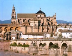 Great Mosque (Cordoba)
Cordoba Spain, Umayyad 785-786
Double-arched columns articulatd in alternating bands of color on each voussoir
Light, open, airy interior
Horseshoe-shaped arches have a tradition in Visigothic Spain and Roman architecture
Hypostyle mosque with no central focus or congregational worship
Original wooden ceiling replaced by vaulting
Complex dome over mihrab with elaborate squinches
Columns are spolia from ancient Roman structures
Relatively short columns made ceilings low, doubling of arches enhances interior space influenced by previous Roman aqueducts
Kufic calligraphy on the walls
Built on site of a church, after Christian reconquest center of the mosque was used for a church Great Mosque (Cordoba)
Cordoba Spain, Umayyad 785-786
Double-arched columns articulatd in alternating bands of color on each voussoir
Light, open, airy interior
Horseshoe-shaped arches have a tradition in Visigothic Spain and Roman architecture
Hypostyle mosque with no central focus or congregational worship
Original wooden ceiling replaced by vaulting
Complex dome over mihrab with elaborate squinches
Columns are spolia from ancient Roman structures
Relatively short columns made ceilings low, doubling of arches enhances interior space influenced by previous Roman aqueducts
Kufic calligraphy on the walls
Built on site of a church, after Christian reconquest center of the mosque was used for a church