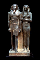 King Menkaura and Queen
Old Kingdom, Fourth Dynasty. c. 2490-2472 B.C.E. Greywacke
Representational, proportional, frontal viewpoint, hierarchical structure.
They were perfectly preserved and nearly life-size. This was the modern world's first glimpse of one of humankind's artistic masterworks, the statue of Menkaura and queen. King Menkaura and Queen
Old Kingdom, Fourth Dynasty. c. 2490-2472 B.C.E. Greywacke
Representational, proportional, frontal viewpoint, hierarchical structure.
They were perfectly preserved and nearly life-size. This was the modern world's first glimpse of one of humankind's artistic masterworks, the statue of Menkaura and queen.