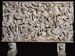 Ludovisi Battle Sarcophagus
Late Imperial Rome
250 C.E.
Marble
Very crowded surface with many figures surrounding each other
Heavy relief carving with contrast between figures and shadow created by the deep spaces between them
Figures lack individuality
Romans appear noble and serious while the barbarians look uncivilized with wild expressions
Confusion of battle shown by the multitude of people and their varying poses
Roman army appears triumphant over bearded barbarians lying beneath them
Figures get smaller at the bottom
Youthful general at top without weapons, no helmet showing he is invinicible and doesn't need protection
Empire not stable during this time and is instable as barbarians begin to raid Rome Ludovisi Battle Sarcophagus
Late Imperial Rome
250 C.E.
Marble
Very crowded surface with many figures surrounding each other
Heavy relief carving with contrast between figures and shadow created by the deep spaces between them
Figures lack individuality
Romans appear noble and serious while the barbarians look uncivilized with wild expressions
Confusion of battle shown by the multitude of people and their varying poses
Roman army appears triumphant over bearded barbarians lying beneath them
Figures get smaller at the bottom
Youthful general at top without weapons, no helmet showing he is invinicible and doesn't need protection
Empire not stable during this time and is instable as barbarians begin to raid Rome
