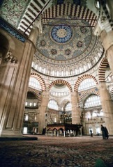 Mosque of Selim II Interior
Sinan (architect),Edirne, Turkey, 1568-1575, Brick and Stone
Very thin tall minarets
Numerous windows make for brilliantly lit interior
Decorative display of mosaics and tile work for interior
Inspired by Hagia Sophia, though this is a completely central plan
Octagonal interior contrasts with conventional mosques that have partitioned interiors
Hospital, school, library, etc. all part of the complex
Sinan was chief court architect for Suleiman the Magnificent
Transitions from a square ground plan to round dome done with insertion of smaller domes that act as squiches
8 Large piers support the dome Mosque of Selim II Interior
Sinan (architect),Edirne, Turkey, 1568-1575, Brick and Stone
Very thin tall minarets
Numerous windows make for brilliantly lit interior
Decorative display of mosaics and tile work for interior
Inspired by Hagia Sophia, though this is a completely central plan
Octagonal interior contrasts with conventional mosques that have partitioned interiors
Hospital, school, library, etc. all part of the complex
Sinan was chief court architect for Suleiman the Magnificent
Transitions from a square ground plan to round dome done with insertion of smaller domes that act as squiches
8 Large piers support the dome