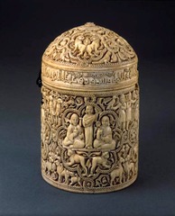Pyxis of al-Mughira
Umayyad 968 C.E., Ivory
Calligraphic inscription in Arabic identifies the owneras al-Mughira, son of a caliph, asks for Allah's blessing, tell the function of the Pyxis
Used as a container for expensive aromatics
Gift for the caliphs younger son at the time
Horror Vacui present as the entire space is filled with patterning
Vegetal/Geometric motifs
8 medallion scenes showing the pleasure activities of the royal court
Muslim Spain Pyxis of al-Mughira
Umayyad 968 C.E., Ivory
Calligraphic inscription in Arabic identifies the owneras al-Mughira, son of a caliph, asks for Allah's blessing, tell the function of the Pyxis
Used as a container for expensive aromatics
Gift for the caliphs younger son at the time
Horror Vacui present as the entire space is filled with patterning
Vegetal/Geometric motifs
8 medallion scenes showing the pleasure activities of the royal court
Muslim Spain