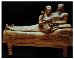 Sarcophagus of the Spouses
Etruscan, 520 B.C.E
Terra Cotta
Large ceramic container with two figures that serve as a lid for this sarcophagus
Very naturalistic flowing representation of the figures with arms extending into the space of the viewer
Cut in half so the terra cotta could fit into a kiln
Figures arms appear to be holding something possibly a pomegranate or egg representing the eternal life
Smile on figures similar to that of the greek archaic smile, archaic period in Greece at the time so probably influenced by Kourous figures
Figures have an intimate relaxed expression and pose as they embrace each other
Shows symbiotic relationship of males and females in Etruscan society, and males had to protect the females
Detailed upper body, with less detail in lower body/legs Sarcophagus of the Spouses
Etruscan, 520 B.C.E
Terra Cotta
Large ceramic container with two figures that serve as a lid for this sarcophagus
Very naturalistic flowing representation of the figures with arms extending into the space of the viewer
Cut in half so the terra cotta could fit into a kiln
Figures arms appear to be holding something possibly a pomegranate or egg representing the eternal life
Smile on figures similar to that of the greek archaic smile, archaic period in Greece at the time so probably influenced by Kourous figures
Figures have an intimate relaxed expression and pose as they embrace each other
Shows symbiotic relationship of males and females in Etruscan society, and males had to protect the females
Detailed upper body, with less detail in lower body/legs
