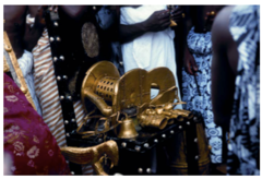 Sika Dwa Kofi
Ashanti Peoples, Ghana, 17th century, gold over wood
Symbol of the Ashanti nation held in Ghana
Contains the stool of the nation
Never actually used as a stool, as it was nver allowed to touch the ground
New king is coronated over the stool
Carried to king on a pillow, he alone is allowed to touch it
Taken out on special occassions
Entire surface inlaid with gold
Bells hang from the sides to warn the king of danger
Replicas often used in ceremonies but each replica is different
British representative tried to sit on the stool in causing rebellion, (War of the Golden Stool) Sika Dwa Kofi
Ashanti Peoples, Ghana, 17th century, gold over wood
Symbol of the Ashanti nation held in Ghana
Contains the stool of the nation
Never actually used as a stool, as it was nver allowed to touch the ground
New king is coronated over the stool
Carried to king on a pillow, he alone is allowed to touch it
Taken out on special occassions
Entire surface inlaid with gold
Bells hang from the sides to warn the king of danger
Replicas often used in ceremonies but each replica is different
British representative tried to sit on the stool in causing rebellion, (War of the Golden Stool)