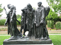 The Burghers of Calais
Auguste Rodin. 1884-1895 C.E. Bronze
He accomplished this by not only positioning each figure in a different stance with the men's heads facing separate directions, but he lowered them down to street level so a viewer could easily walk around the sculpture and see each man and each facial expression and feel as if they were a part of the group, personally experiencing the tragic event. The Burghers of Calais
Auguste Rodin. 1884-1895 C.E. Bronze
He accomplished this by not only positioning each figure in a different stance with the men's heads facing separate directions, but he lowered them down to street level so a viewer could easily walk around the sculpture and see each man and each facial expression and feel as if they were a part of the group, personally experiencing the tragic event.
