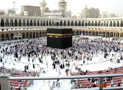 The Kaaba
Mecca, Saudi Arabia. Islamic. Pre-Islamic monument; rededicated by Muhammad in 631-632 C.E.; multiple renovations. Granite masonry, covered with silk curtain and calligraphy in gold and silver-wrapped thread
Cubed building known as the Kaba may not rival skyscrapers in height or mansions in width, but its impact on history and human beings is unmatched. The Kaba is the building towards which Muslims face five times a day, everyday, in prayer. This has been the case since the time of Prophet Muhammad (peace and blessings be upon him) over 1400 years ago. The Kaaba
Mecca, Saudi Arabia. Islamic. Pre-Islamic monument; rededicated by Muhammad in 631-632 C.E.; multiple renovations. Granite masonry, covered with silk curtain and calligraphy in gold and silver-wrapped thread
Cubed building known as the Kaba may not rival skyscrapers in height or mansions in width, but its impact on history and human beings is unmatched. The Kaba is the building towards which Muslims face five times a day, everyday, in prayer. This has been the case since the time of Prophet Muhammad (peace and blessings be upon him) over 1400 years ago.