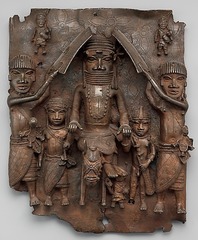 Wall plaque of Oba Palace
Edo Peoples, Benin (Nigeria), 16th century, cast brass
900 brass plaques similar to this one, 16-18 inches
Decorated walls of the royal palace of Benin
Part of palace complex where these plaques would be placed on top of wooden pillars
Demonstrate the court life in Benin culture.
Oba Wall plaque of Oba Palace
Edo Peoples, Benin (Nigeria), 16th century, cast brass
900 brass plaques similar to this one, 16-18 inches
Decorated walls of the royal palace of Benin
Part of palace complex where these plaques would be placed on top of wooden pillars
Demonstrate the court life in Benin culture.
Oba